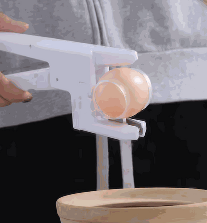 Claver Crack mess-minimizing egg cracker handheld kitchen tool